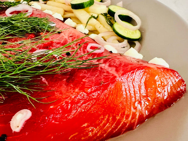 Beetroot & Black Garlic Cured Salmon with Crème Fraiche & Pear & Cucumber Salad