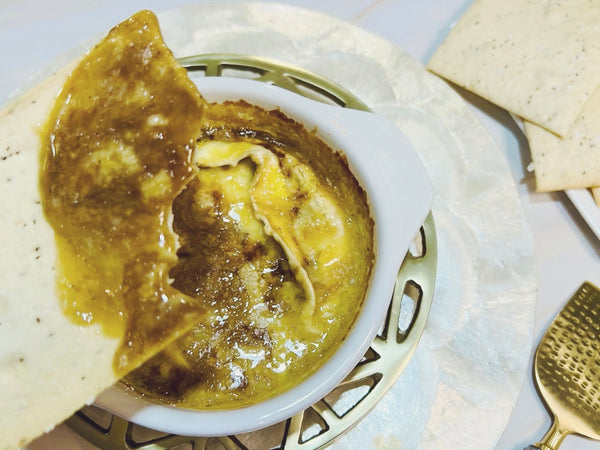 Baked Brie with Caramelized Black Garlic Paste