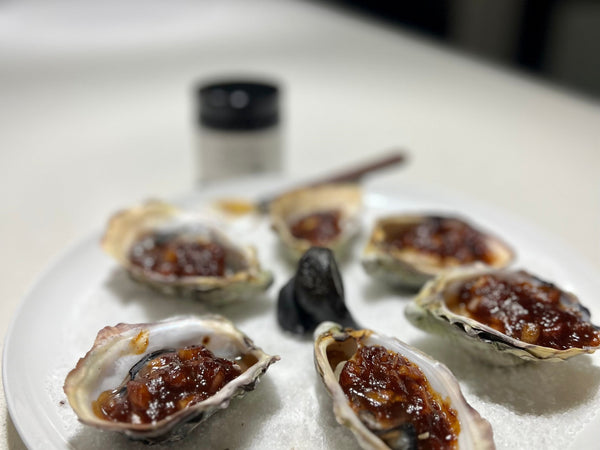 Oysters Kilpatrick with Black Garlic