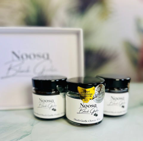 Noosa Black Garlic - Tea Tree Bay Trio. Caramelized Black Garlic Paste, Black Garlic Cloves. Award-winning, The Truffle of the Garlic World. Organic, Australian Black Garlic.